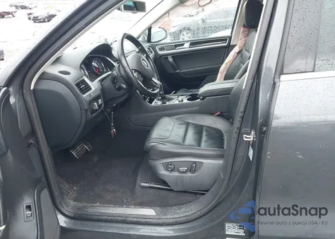 2015 Volkswagen Touareg Tdi Executive z USA, uszkodzony, nr VIN WVGEP9BP9FD003122